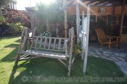 Wodden bench at Palm Court Gardens in Basseterre St Kitts.jpg
