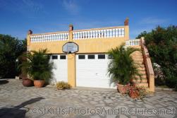 Garage with steps to rooftop at Palm Court Gardens in Basseterre St Kitts.jpg