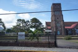 Church in Basseterre St Kitts with distance signs to Dieppe Bay.jpg