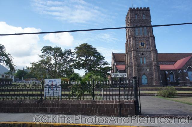 Church in Basseterre St Kitts with distance signs to Dieppe Bay.jpg