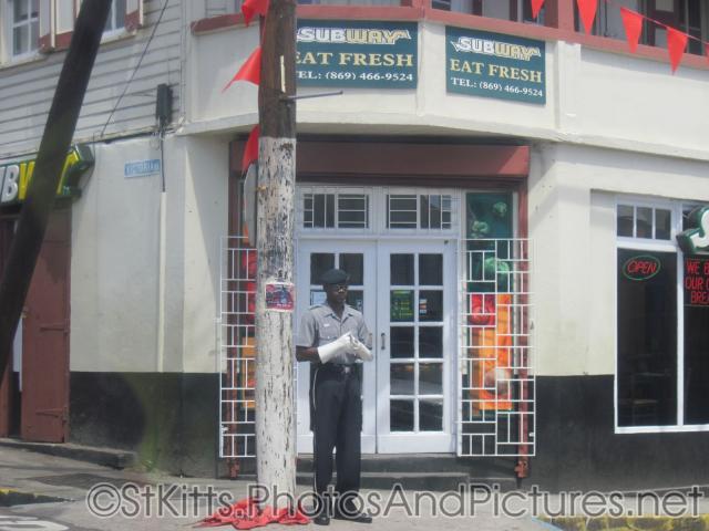 Poilice in uniform in front of Subway at Basseterre St Kitts.jpg
