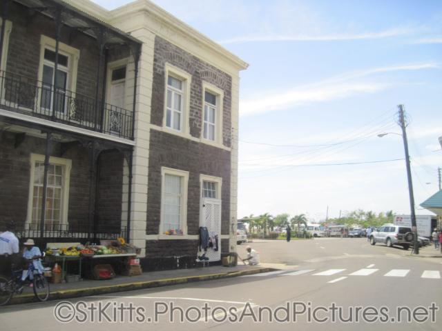 Fruit stands next to National Museum at Basseterre St Kitts.jpg