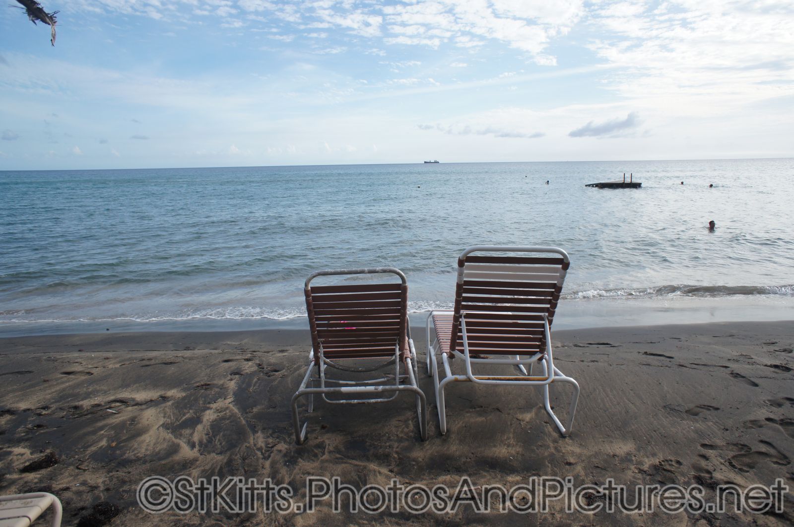 Two beach chairs looking out to the ocean at Shipwreck Bar & Grill at St Kitts.jpg
