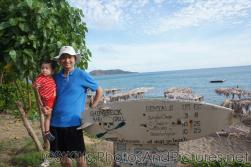 Darwin being held by Daddy at the Shipwreck Bar & Grill in St Kitts.jpg