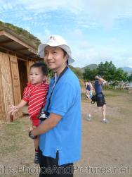 Darwin being held by Daddy at the Shipwreck Bar & Grill in St Kitts 2.jpg