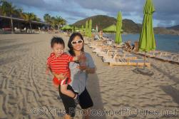 Darwin looking upset as mommy holds him at beach behind Carambola Restaurant in St Kitts.jpg