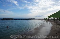 Water meets sand at beach behind Carambola Restaurant in St Kitts.jpg