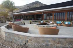 Modern lounge chairs surround a firepit behind Carambola Restaurant in St Kitts.jpg