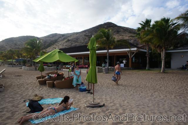 Vacationers at beach behind Carambola Restaurant in St Kitts.jpg
