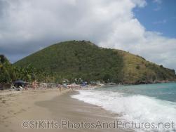 Wave crashes in at Monkey Bar Beach in St Kitts.jpg