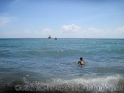 Joann swimming in the waters off of Monkey Bar Beach in St Kitts.jpg