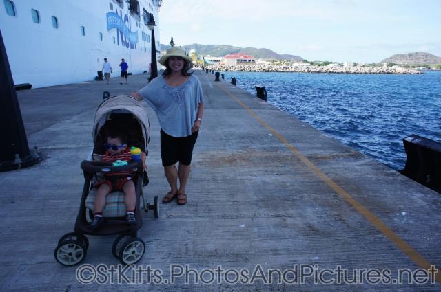 Darwin and mommy at pier next to Norwegian Dawn docked at St Kitts.jpg
