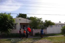 People of St Kitts walking on a sidewalk.jpg