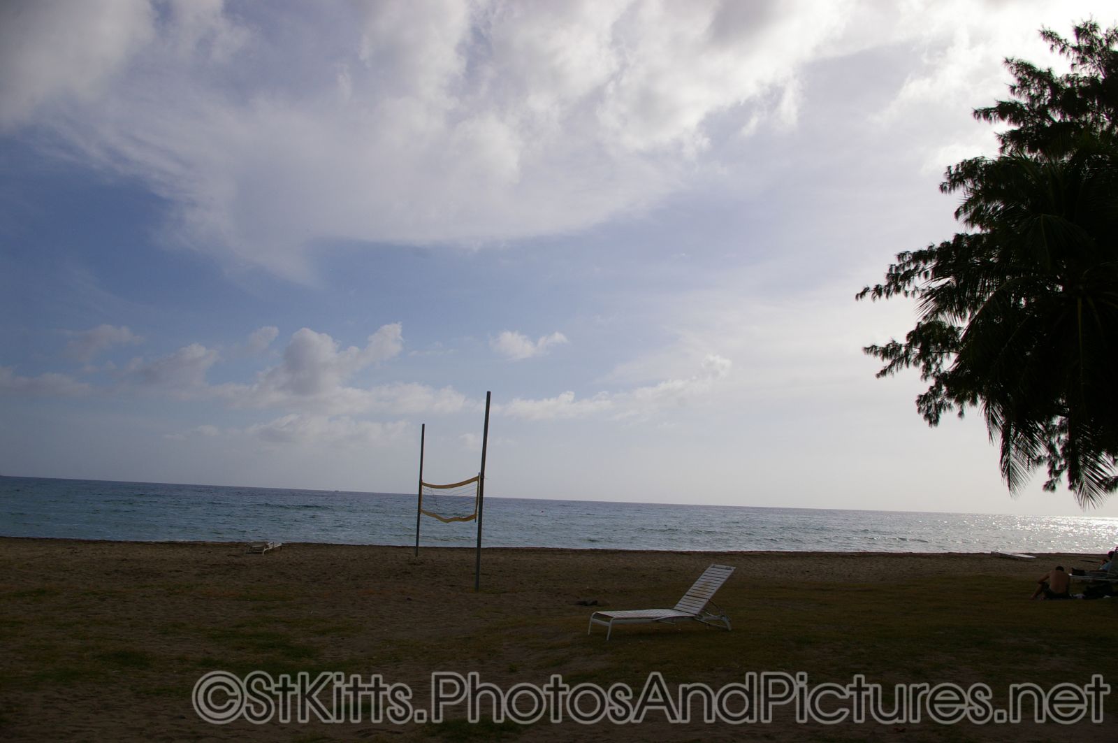 Empty beach chair and volley ball net at a beach in Frigate Bay St Kitts.jpg
