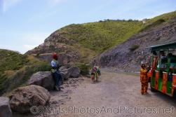Man with donkey at hill top in St Kitts.jpg