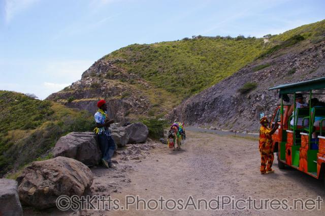 Man with donkey at hill top in St Kitts.jpg