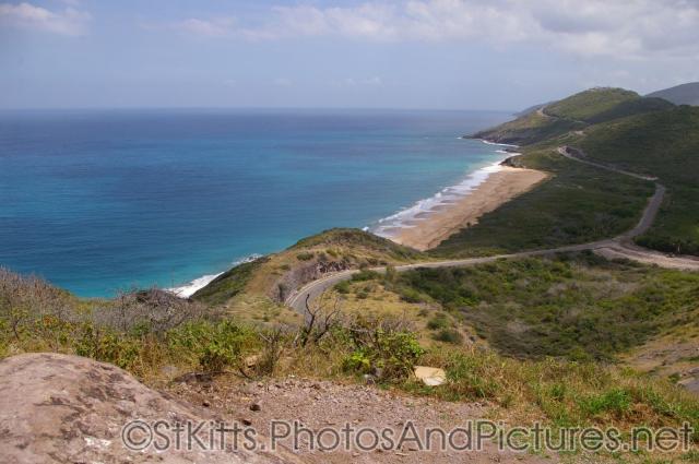 View of empty beach from hill top in St Kitts.jpg