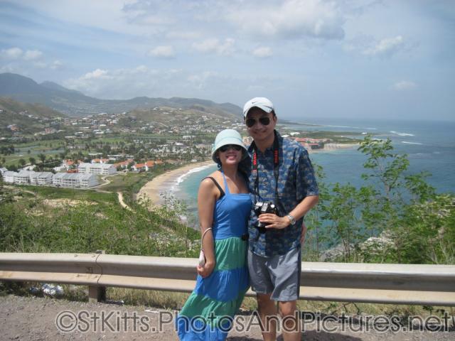 David and Joann with Frigate Beach in the background in St Kitts.jpg
