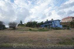 Blue building with Canadian flag in Frigate Bay St Kitts.jpg
