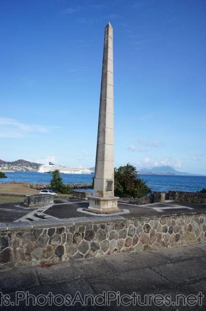 War memorial monument in St Kitts with cruise ship in background.jpg
